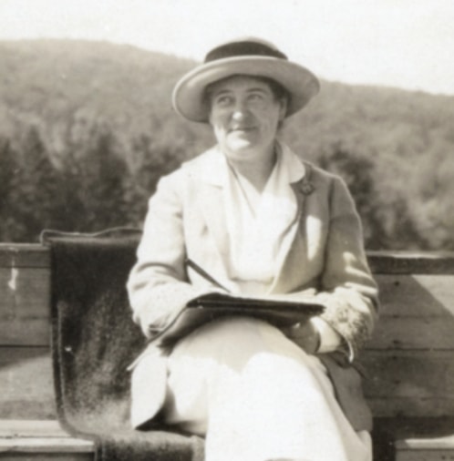 Cather on a bench
