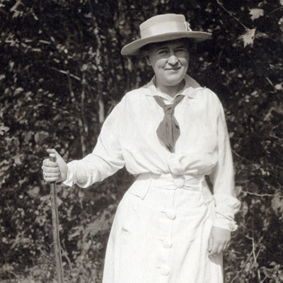 Willa Cather with a walking stick